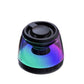 Black magnetic Bluetooth speaker lit in green and violet on white