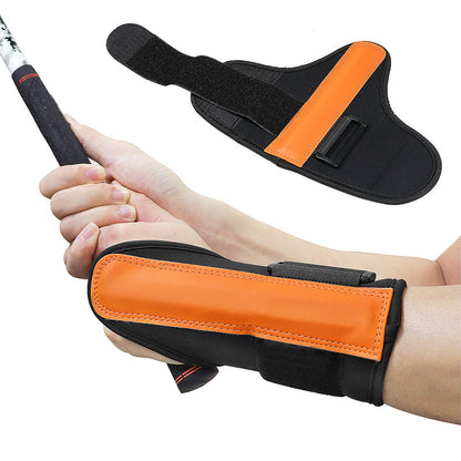 Golf wrist support worn on the forearm while gripping a club, with a second support laid flat beside it