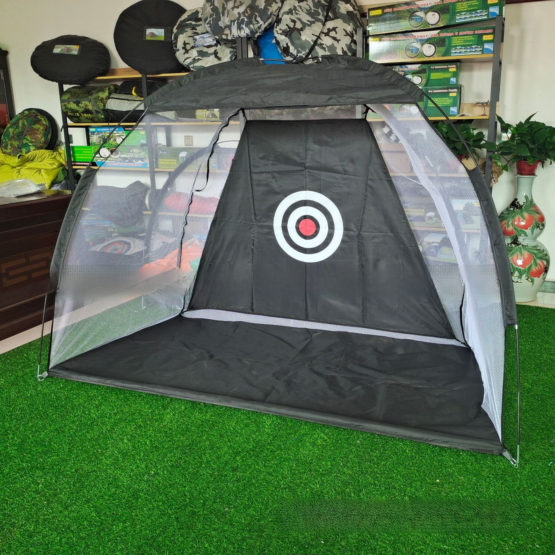 Folded golf practice net bundled compact for storage and transport