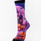 Mid-calf sock on a mannequin printed with a purple haunted castle, bats and a glowing pumpkin