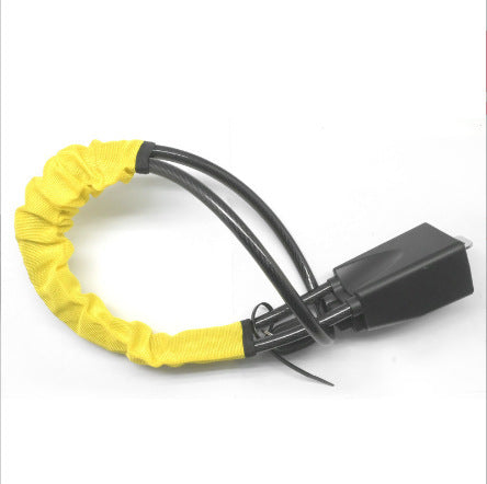 Car steering wheel cable lock shown looped with a fabric sleeve over the steel