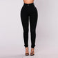 Black high waist skinny jeans, front view on model, size L variant