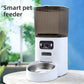 Smart pet feeder with built-in camera and food hopper on the floor