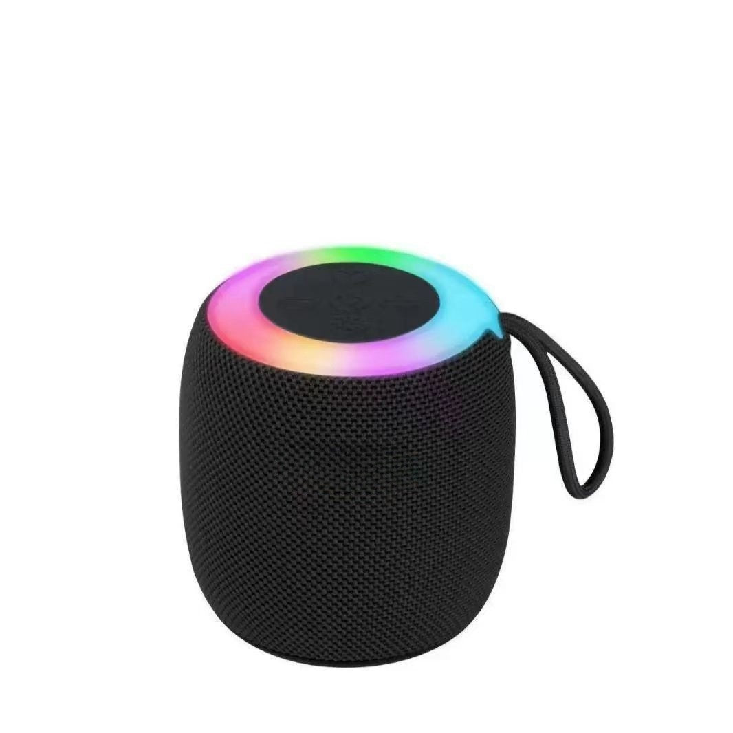 Blue portable Bluetooth speaker with colourful ambient night light glowing