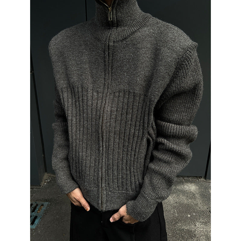 Gray zip front ribbed knit cardigan worn with hands in pockets, image of the size XL option