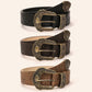 Coiled vintage floral tooled belts in black, brown and tan with ornate antique brass pin buckles