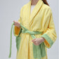 Yellow striped cotton terry bathrobe with green contrast trim, tie belt and patch pockets