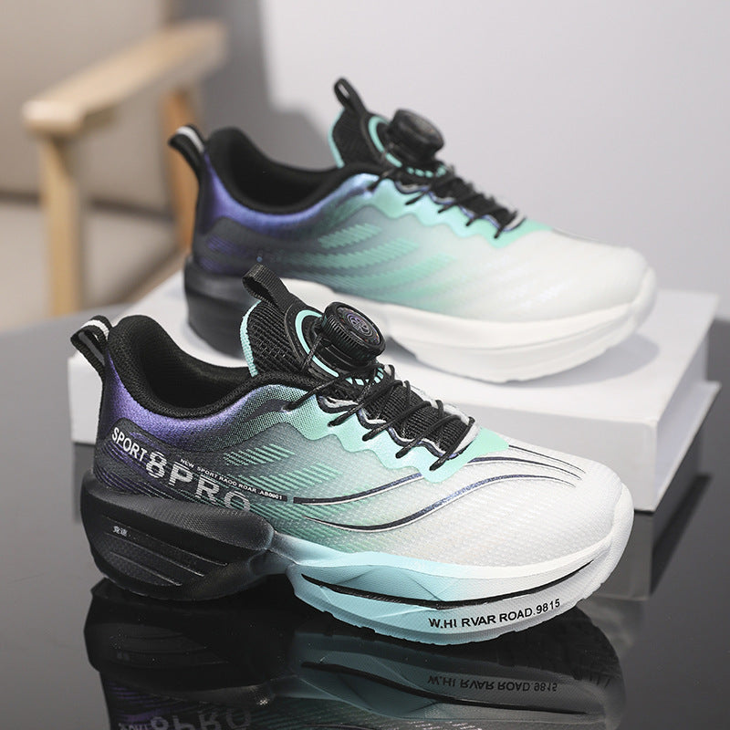 Pair of childrens two tone gradient sneakers showing the breathable mesh upper and dial closure