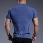 Men's quick-dry fitness t-shirt styled with shorts for the gym