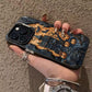 Halloween printed iPhone case with a black camera frame held sideways against a stucco wall
