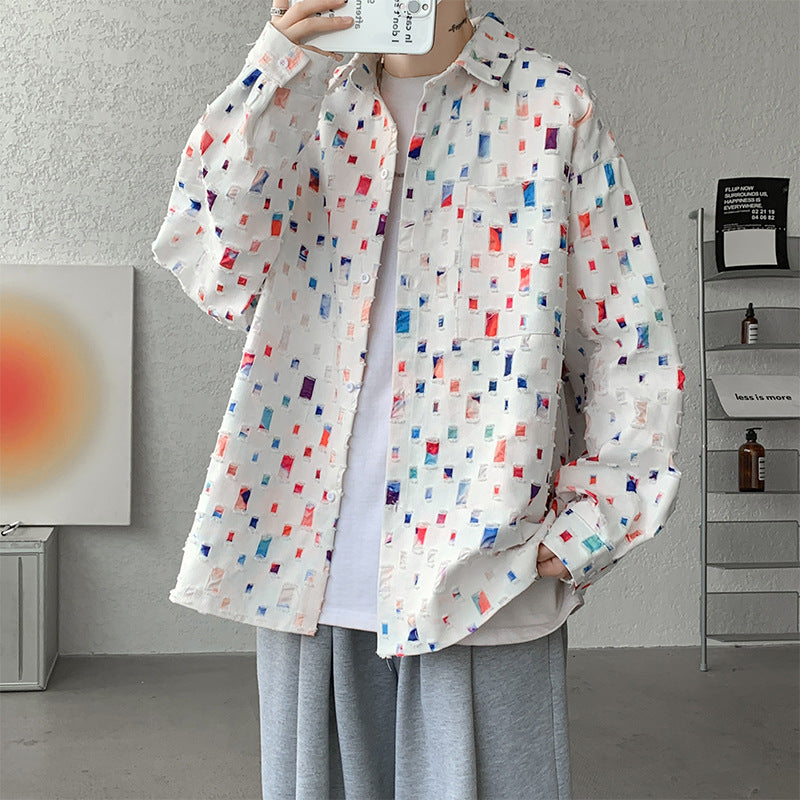 Distressed button shirt with frayed squares showing flecks of colour, loose oversized cut