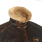 Brown vegan leather aviator jacket with plush sherpa cuffs and a straight lined hem