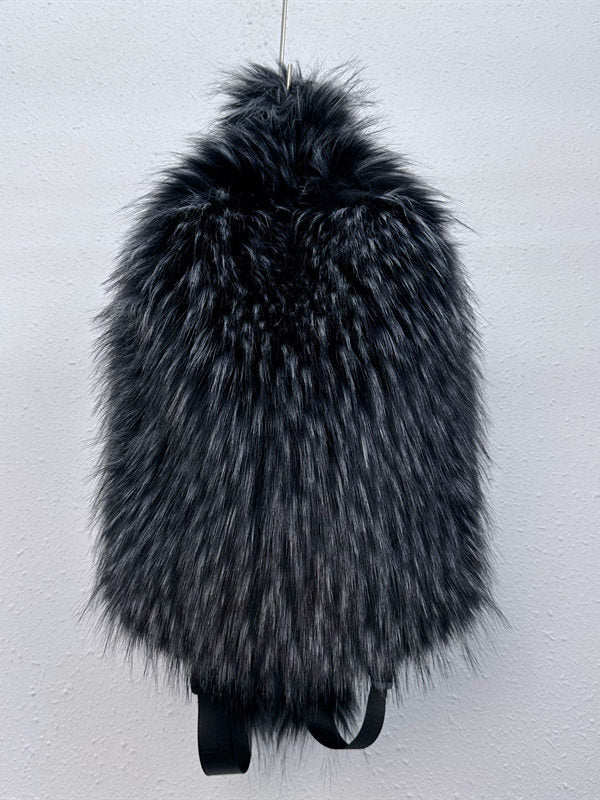 Plush fur travel backpack side profile with padded shoulder straps
