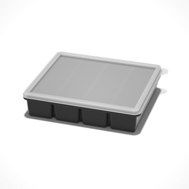 Flexible platinum silicone ice cube tray held flexed to pop out cubes for portioning purees