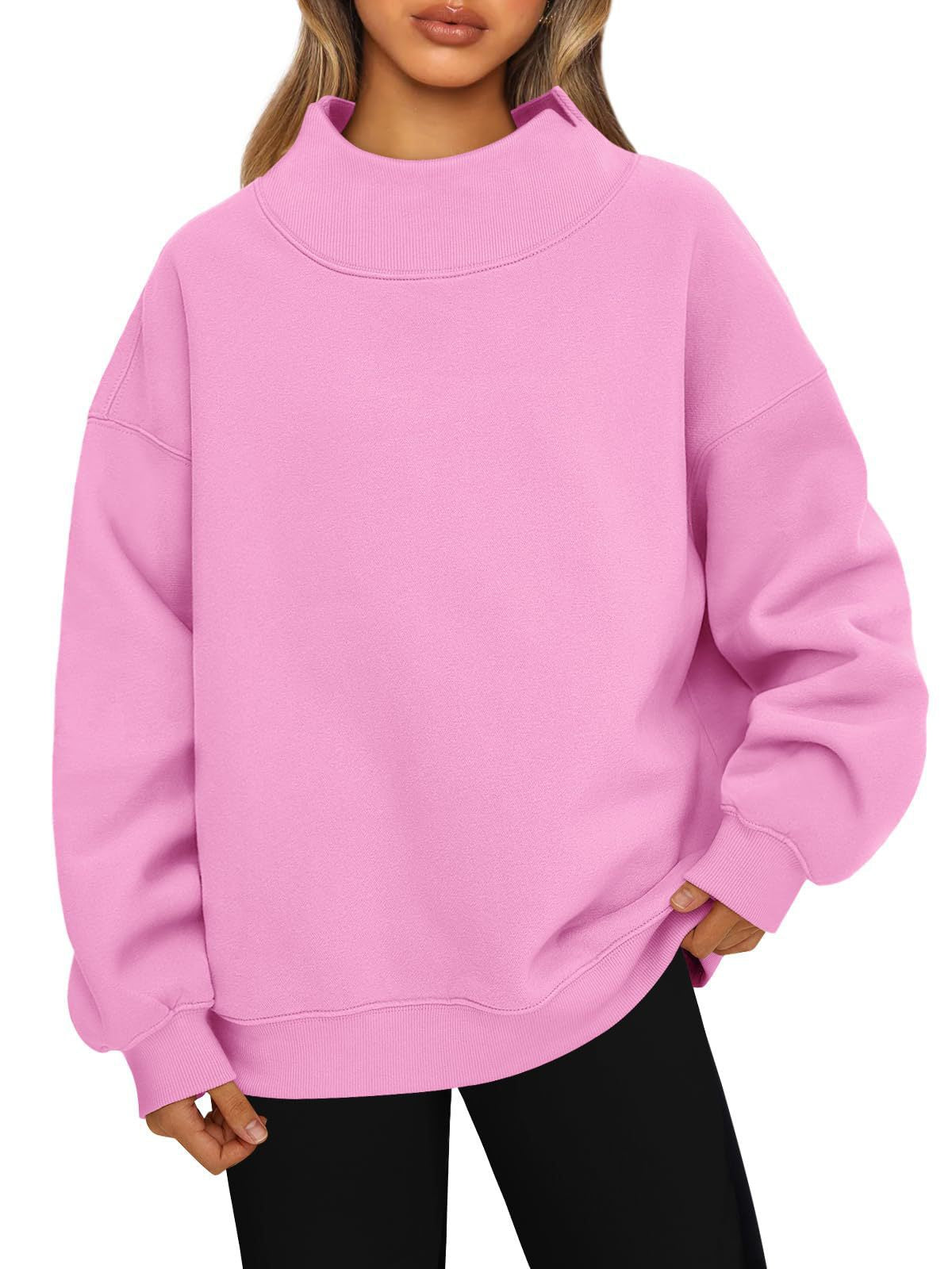 Pink oversized mock neck sweatshirt with ribbed cuffs and hem, worn with black leggings, photo for size S