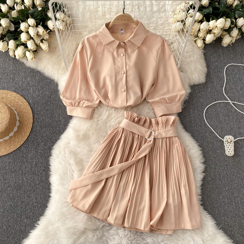 Close-up of the lightweight woven fabric on the shirt and skirt set