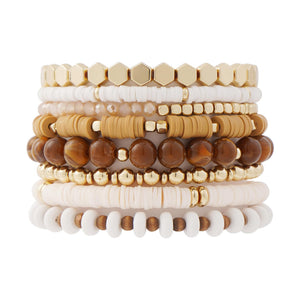 Stacked beaded bracelet set in white and tan heishi discs, stone beads and gold-tone metal