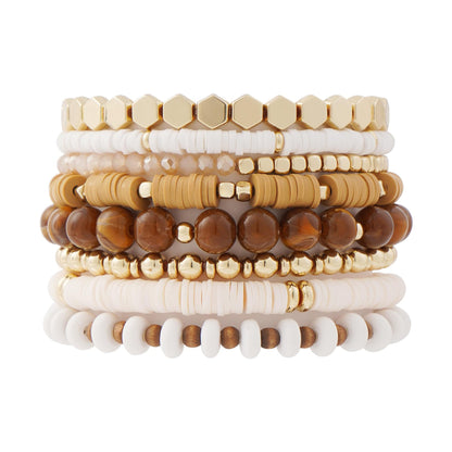 Stacked beaded bracelet set in white and tan heishi discs, stone beads and gold-tone metal