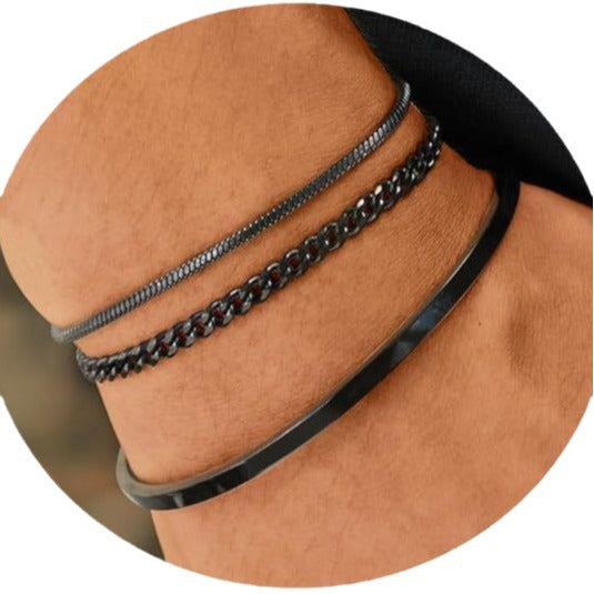 Silver layered bracelet set of three stacked on a wrist
