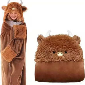 Highland cow hooded cape blanket on a model with a plush horned hood and plush paw cuff