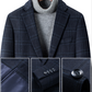 Men's navy check wool blend single breasted blazer detail of a horn look front button on the check