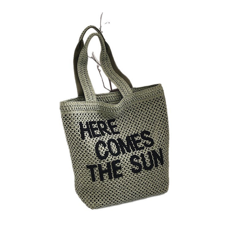 Embroidered Woven Shoulder Bag | scale reference with hand