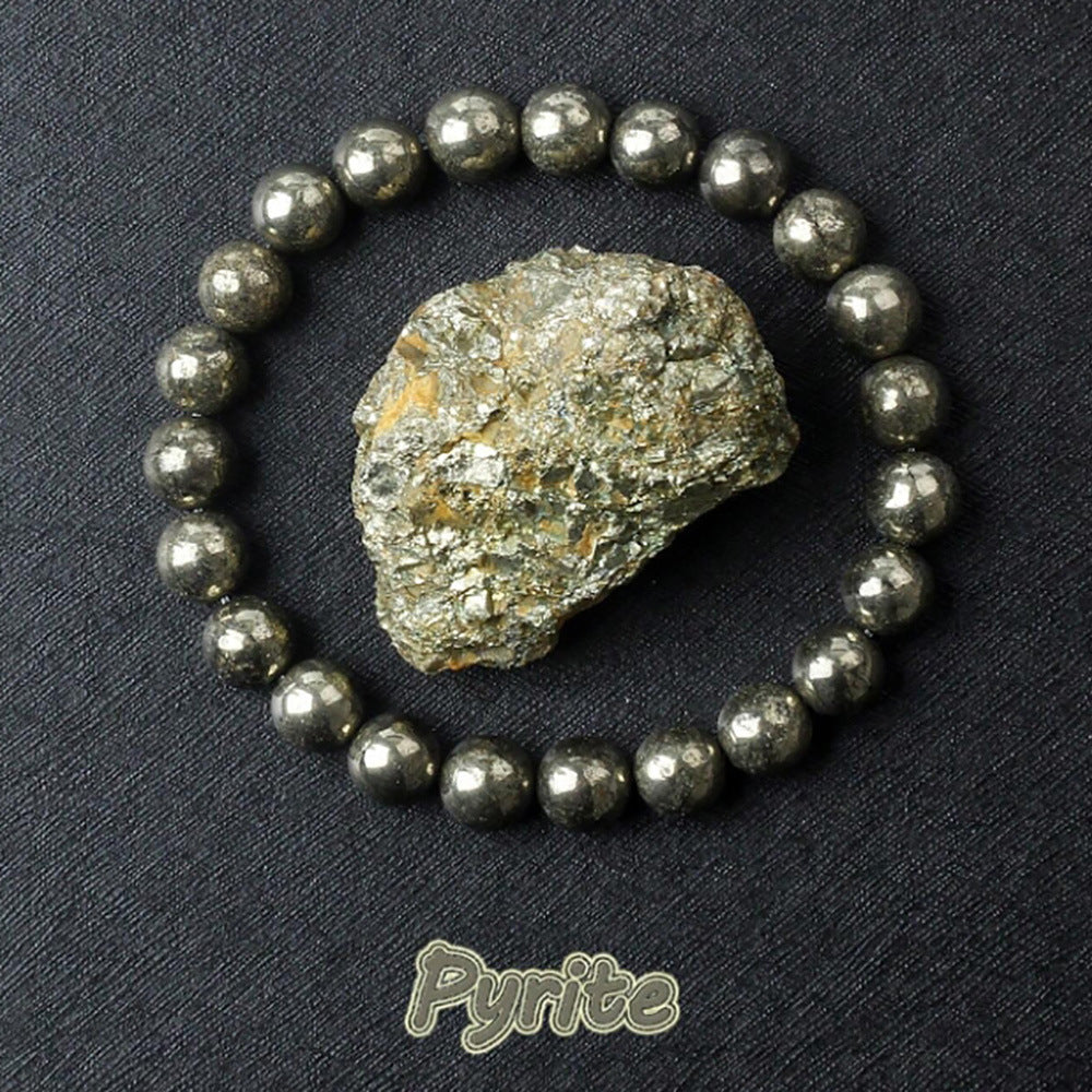 Pyrite beaded bracelet side profile showing the stretch cord strand of round beads