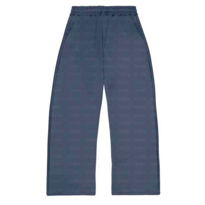 Flat lay of the grey white cropped hoodie beside its matching trousers