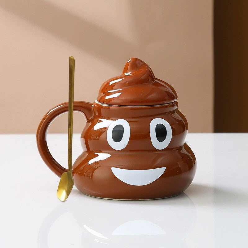 Brown ceramic poop shaped mug with the pointed lid removed to show the open drinking rim