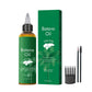 Green batana seed hair and scalp oil bottle and box with a palm motif, scalp comb and spoolie brushes