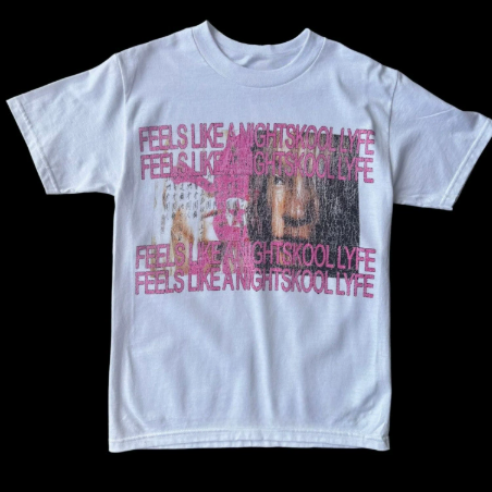 Front view of a white oversized graphic t-shirt with faded pink text print