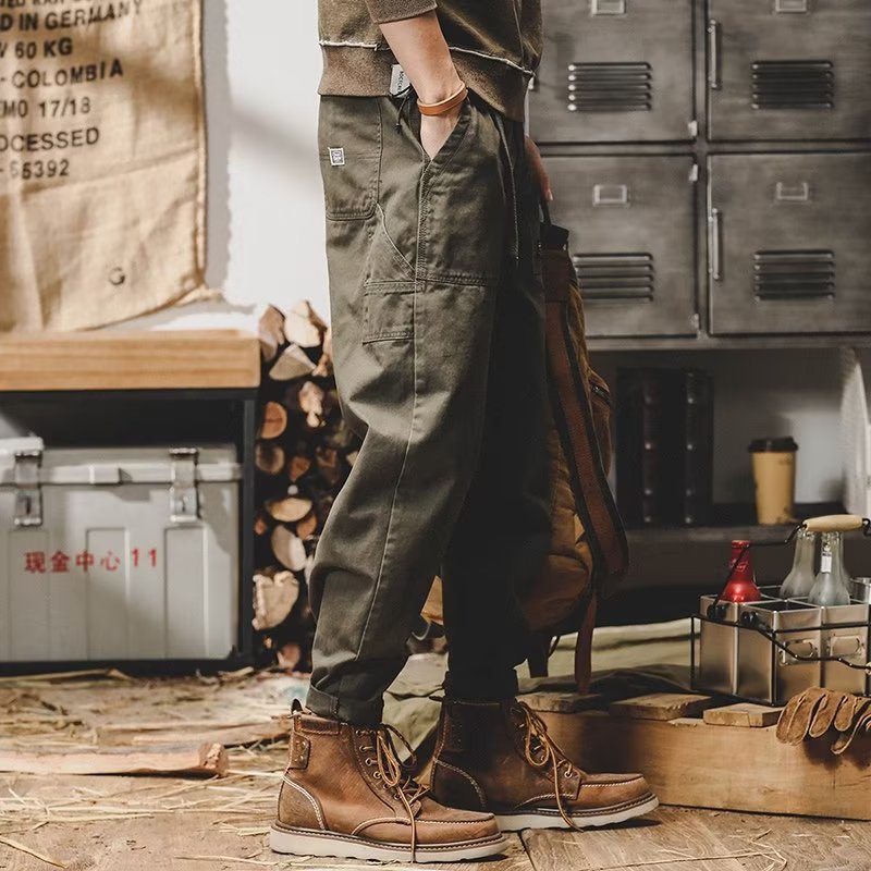 Loose fit cargo pants worn with sneakers in a casual everyday outfit