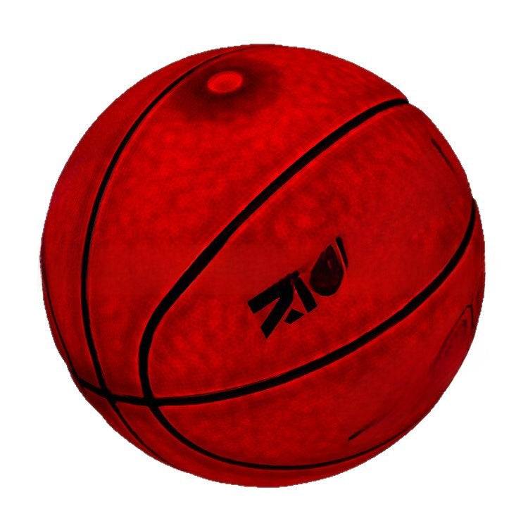 Basketball glowing deep red with its LED light on, black channel lines visible across the lit surface
