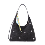 Single-shoulder bucket bag shown at an everyday carry angle with strap