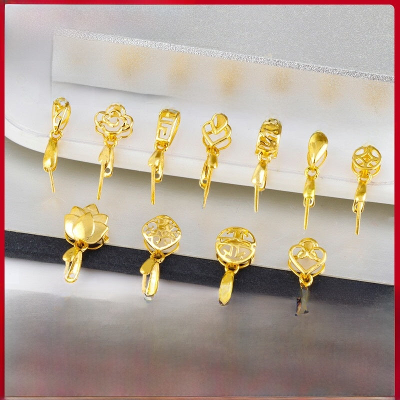 Gold-tone jewelry finding resting on a neutral background