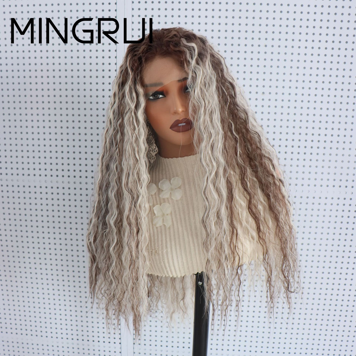 Three quarter view of a 26 inch brown and platinum blonde wavy lace front wig falling past the shoulders