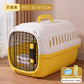 Small dog sitting inside the ventilated hard plastic pet travel crate