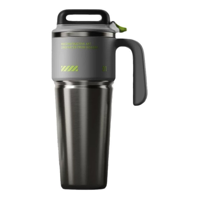 Gray insulated stainless steel travel mug with a lid handle and a molded side carry handle on white