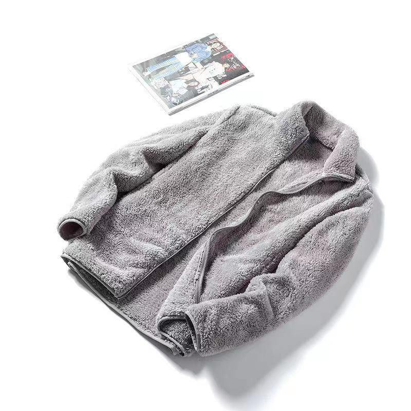 Double sided plush fleece zip jacket with a tall stand collar shown flat on a plain background