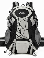 Black and light gray hiking backpack with hip belt, side mesh pockets and two front buckle straps, front view