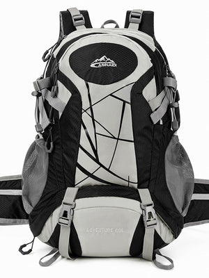 Black and light gray hiking backpack with hip belt, side mesh pockets and two front buckle straps, front view