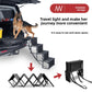 Black foldable pet stairs folded flat with attached carry straps for storage