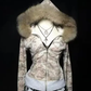 Front of the camouflage zip-up hoodie with a fur trimmed hood and a gray ribbed hem band on a black background