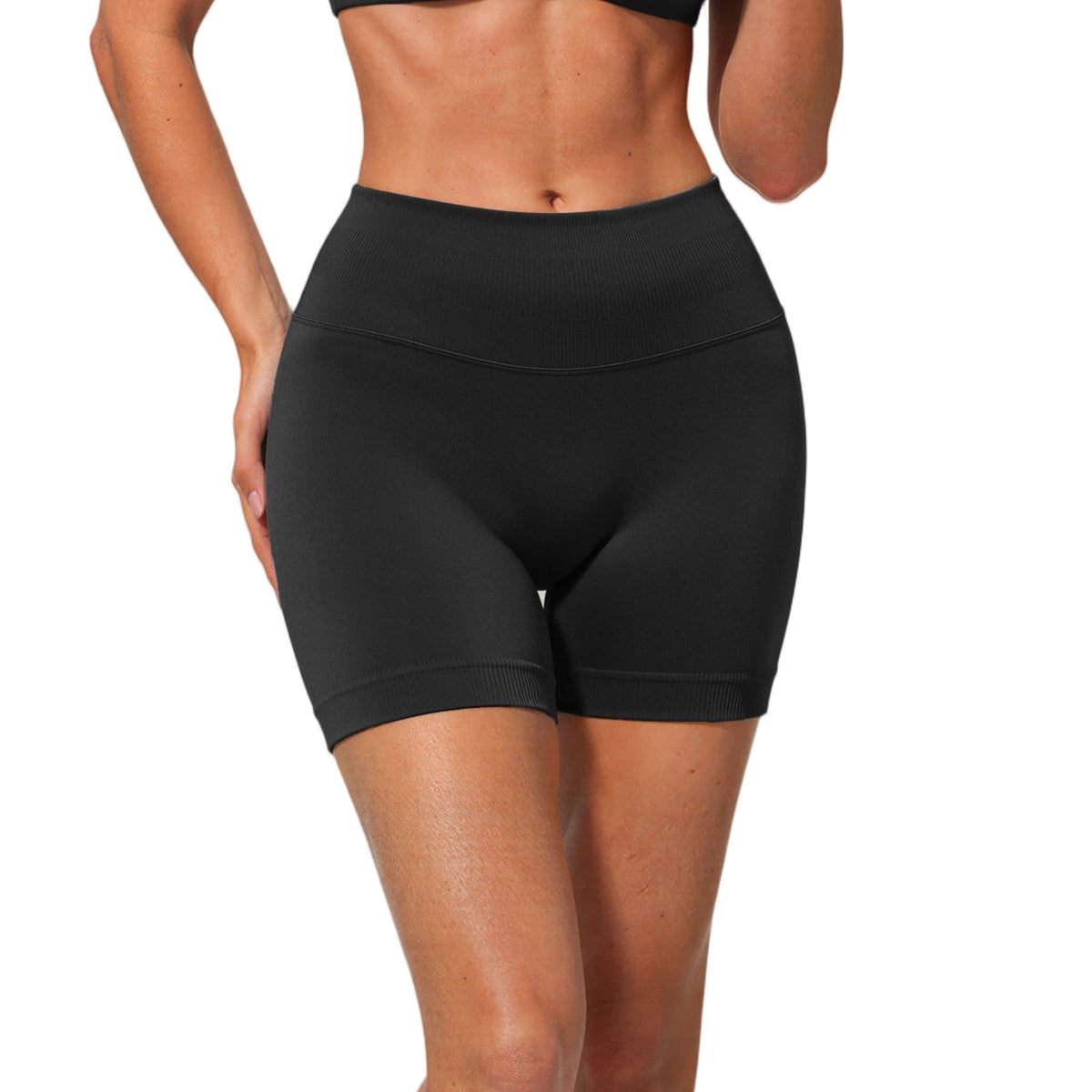 Black high waisted seamless yoga shorts with a wide ribbed waistband, front view, size L option