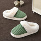 Covered toe mule slippers with a plush cuff around the opening and a thick platform sole
