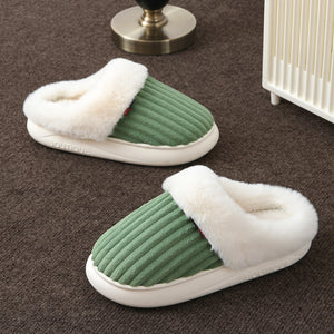 Covered toe mule slippers with a plush cuff around the opening and a thick platform sole