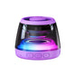 Compact magnetic Bluetooth speaker with a translucent lit body on white