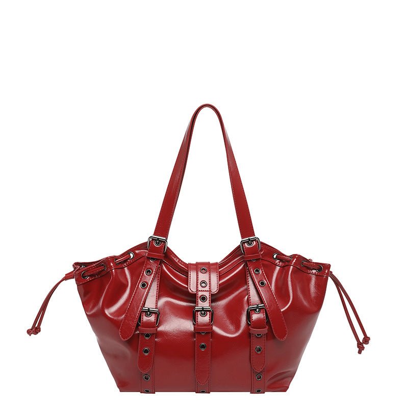 Glossy red hobo shoulder bag with buckle straps, grommets and drawstring sides, option Red