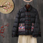 Embroidered down jacket laid flat showing the quilted body