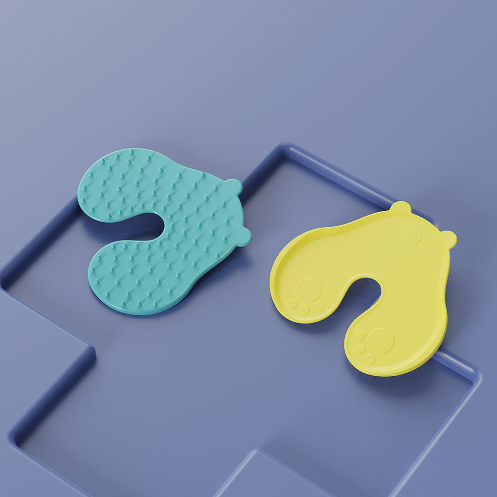 Mint textured contact point face beside yellow smooth face of the bear shaped injection skin pad